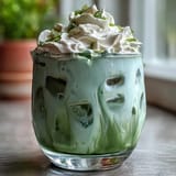 A luscious Mother's Day Iced Matcha Latte with Vanilla Cold Foam, ready to be enjoyed.