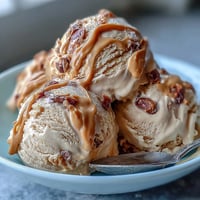 Creamy 4-ingredient peanut butter banana ice cream, ready for scooping.